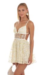 Picture Jaelynn Shimmer Floral Mini Dress in Yellow. Source: https://media.lucyinthesky.com/data/May23/150xAUTO/c8748090-e6a4-4a75-a468-8b9605793be4.jpg