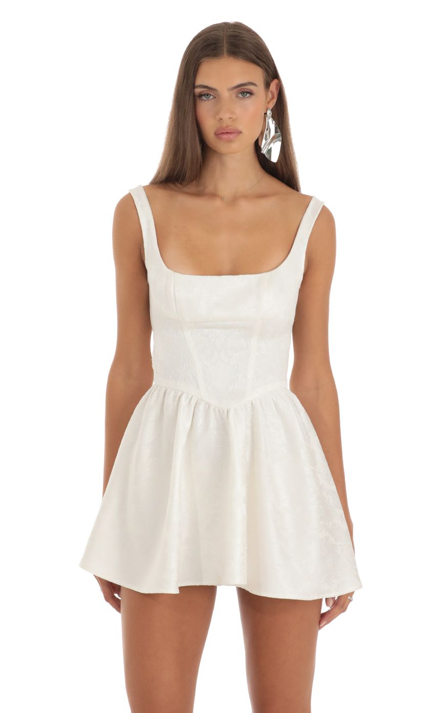 Picture Indiana Jacquard Mini Dress in White. Source: https://media.lucyinthesky.com/data/May23/850xAUTO/1025fd03-ac85-4eb7-abe9-1b6abff69089.jpg