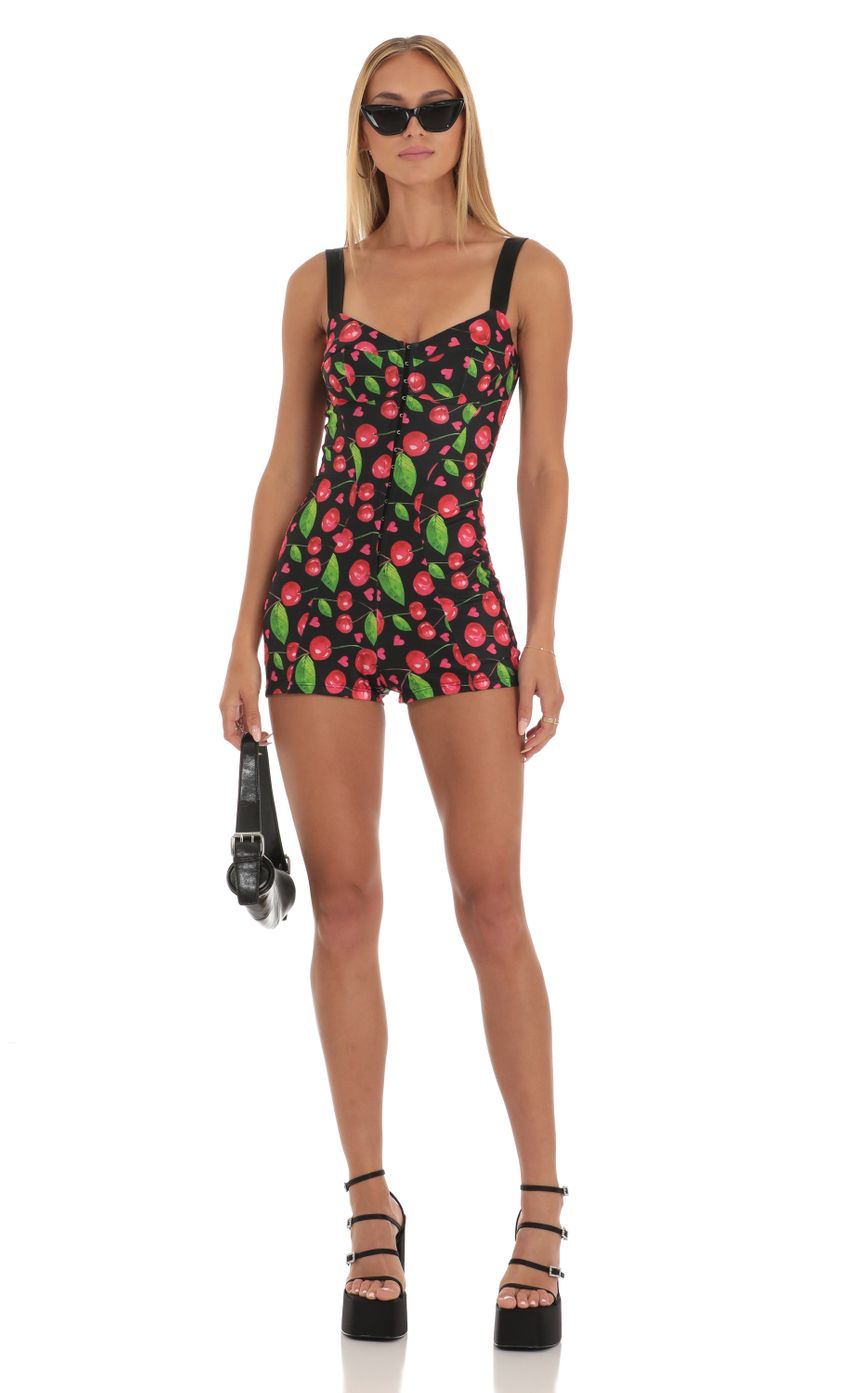Picture Rada Hook and Eye Romper in Black Cherry Print. Source: https://media.lucyinthesky.com/data/May23/850xAUTO/1a582fc2-bcd2-421b-97bd-4cc2164f0b5a.jpg
