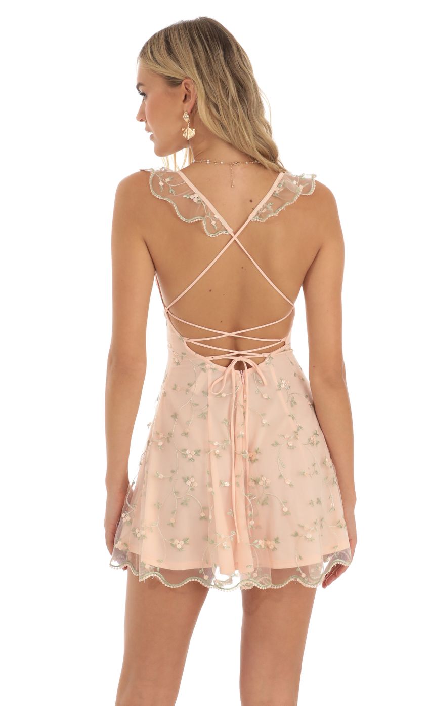 Picture Tillee Floral Embroidered Mini A-Line Dress in Peach. Source: https://media.lucyinthesky.com/data/May23/850xAUTO/1ccd4cfe-ec79-49aa-ba55-f2c954c7f5e1.jpg