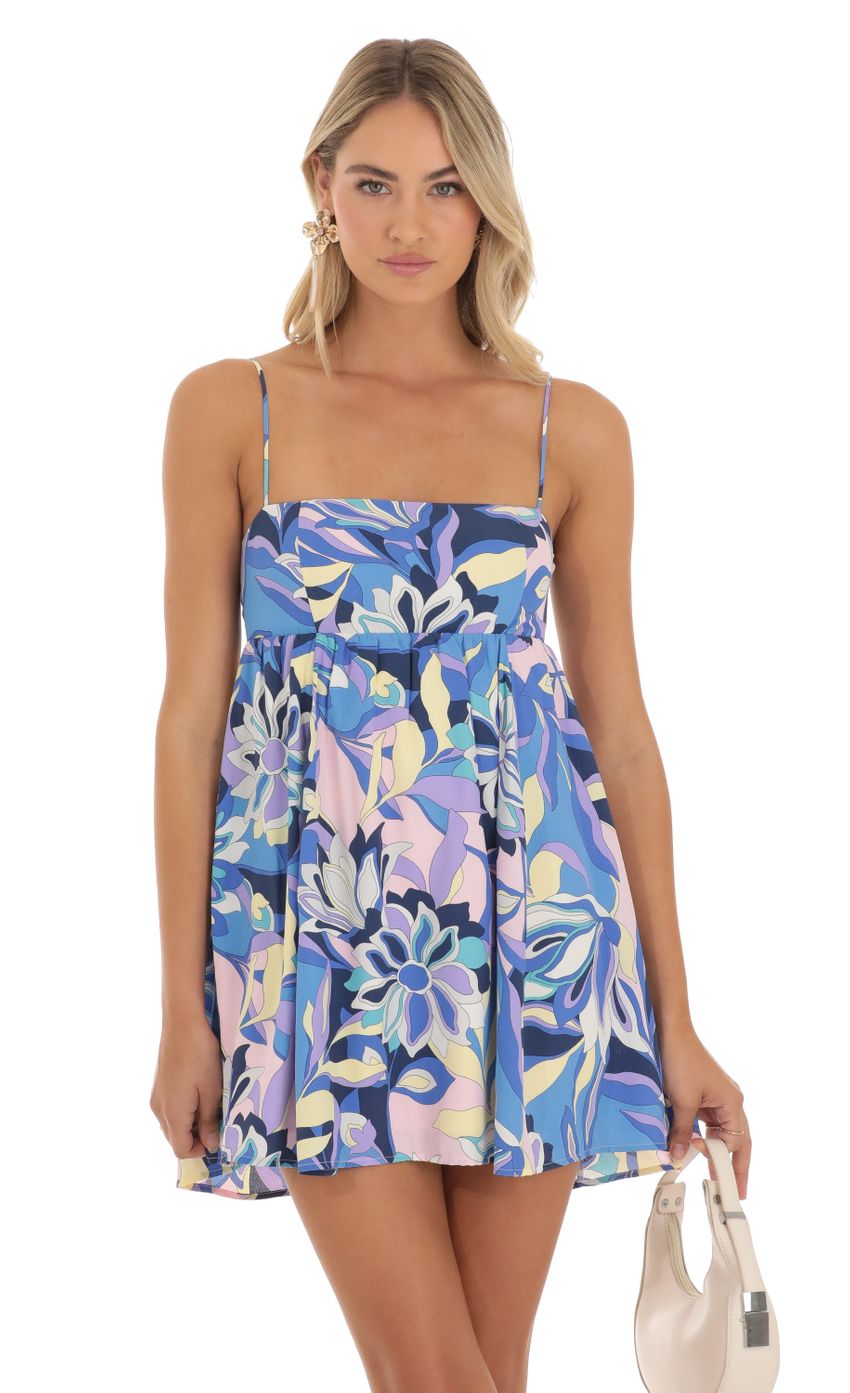 Picture Juno Floral Printed Baby Doll Dress in Blue. Source: https://media.lucyinthesky.com/data/May23/850xAUTO/2ca72ecb-7a33-4d0c-97d9-12b3dc95a895.jpg