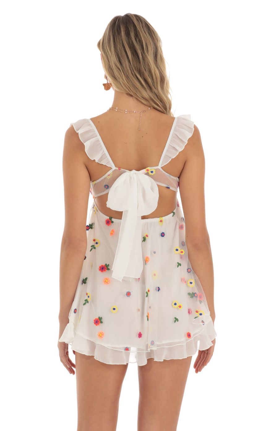 Picture Saanvi Multi Floral Babydoll Dress in White. Source: https://media.lucyinthesky.com/data/May23/850xAUTO/36e12670-ef2c-48f1-869f-797e73182742.jpg