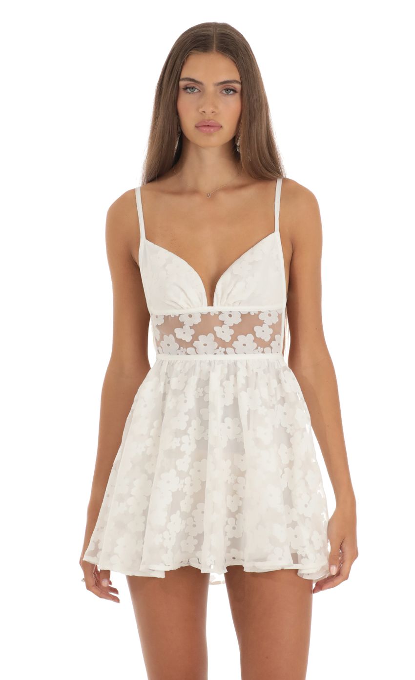 Picture Jaelynn Floral Mini Dress in White. Source: https://media.lucyinthesky.com/data/May23/850xAUTO/3b3f6bb9-f62b-4857-8e30-f23968f4e008.jpg