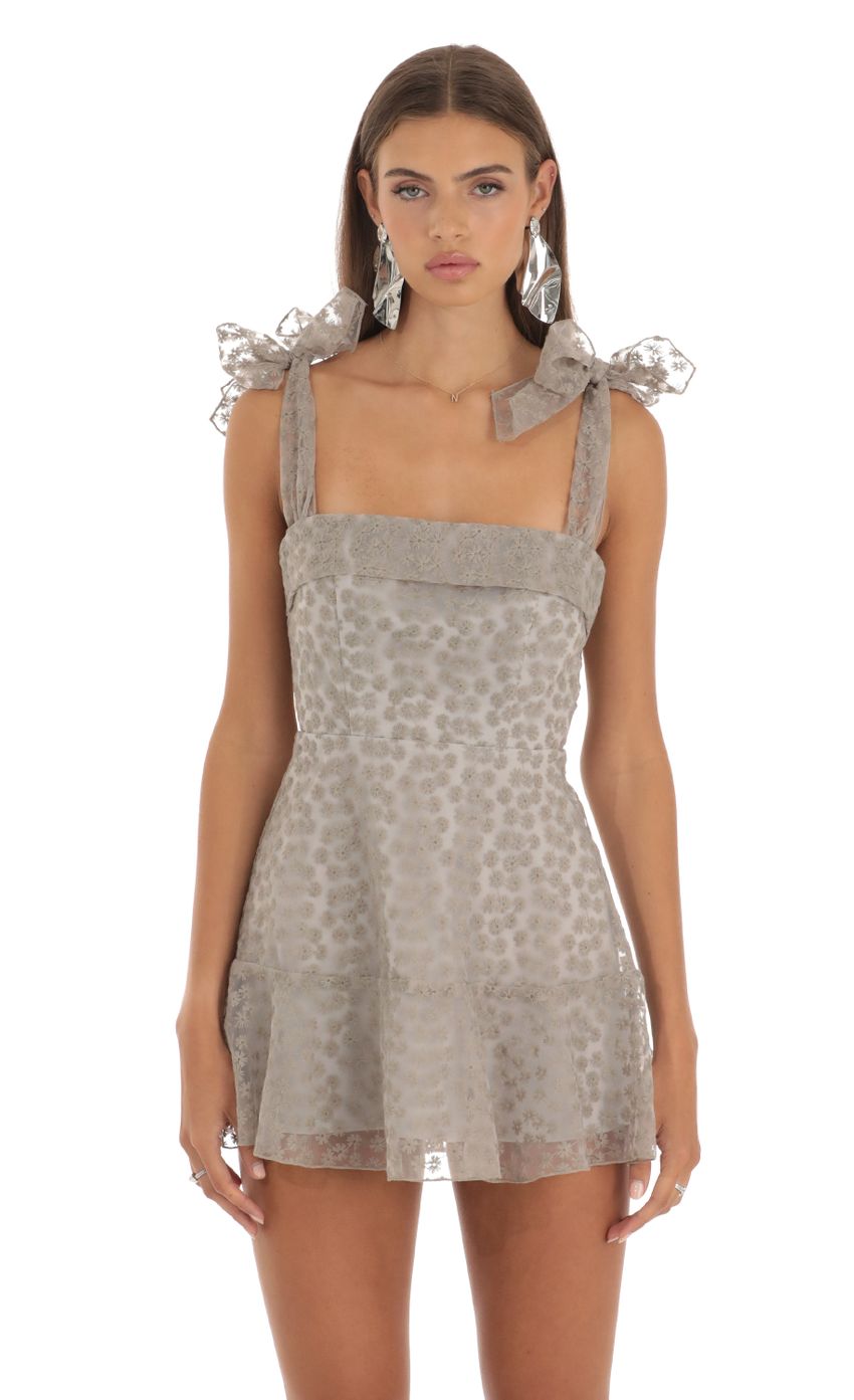 Picture Zev Embroidered Floral Mini Dress in Grey. Source: https://media.lucyinthesky.com/data/May23/850xAUTO/42f8dce9-a6e4-43f3-8d56-8f6119a4e87b.jpg
