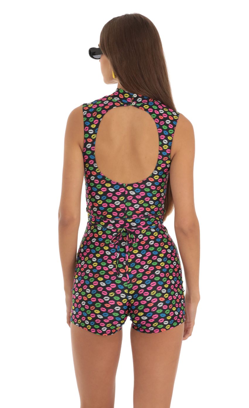 Picture Keily Kiss Cutout Romper in Black. Source: https://media.lucyinthesky.com/data/May23/850xAUTO/4a9a1b8e-c5c7-4746-bc6d-8a8eb1e0bfb1.jpg