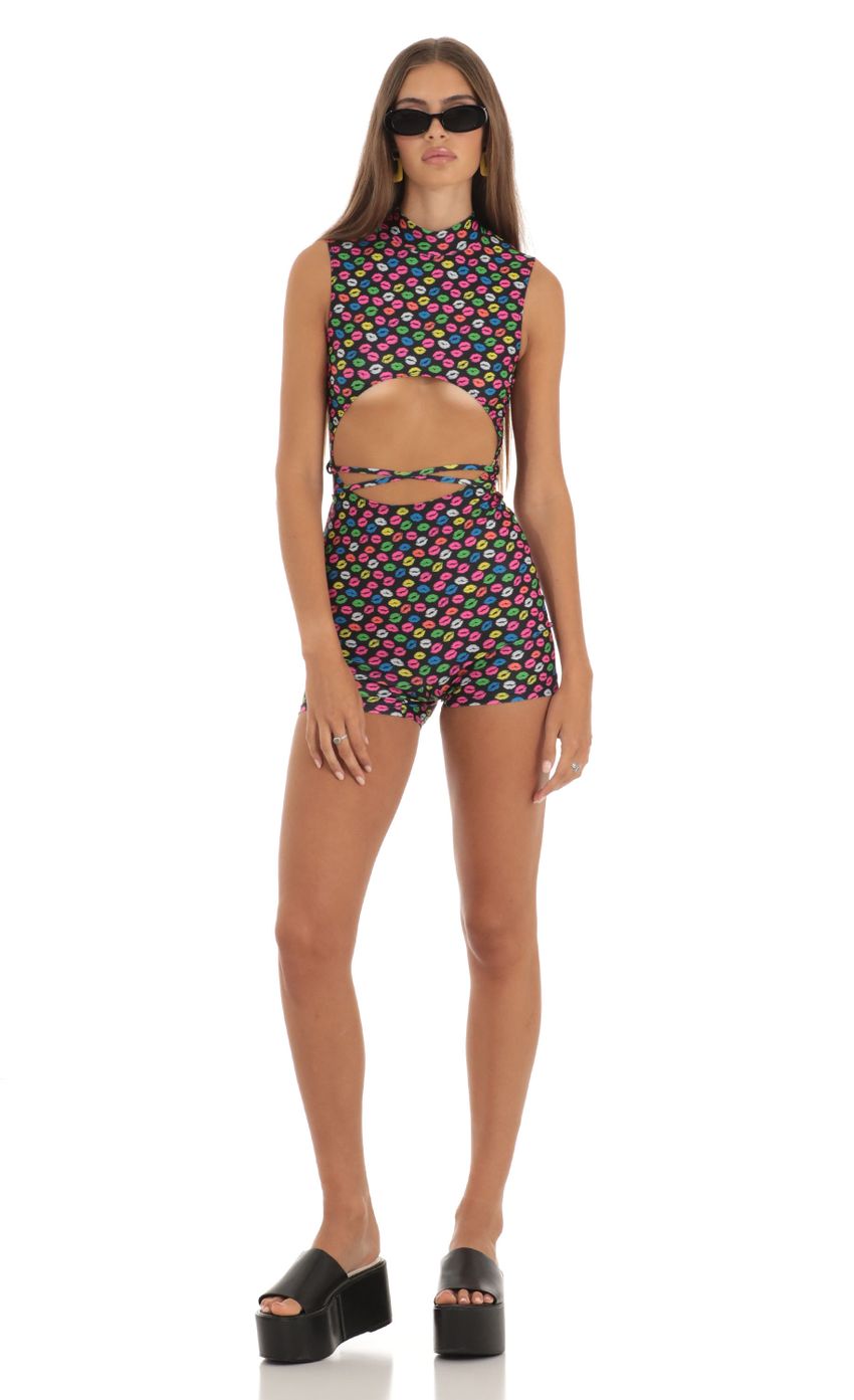 Picture Keily Kiss Cutout Romper in Black. Source: https://media.lucyinthesky.com/data/May23/850xAUTO/4b39a34f-7c24-4a2c-a488-ecffa464a194.jpg