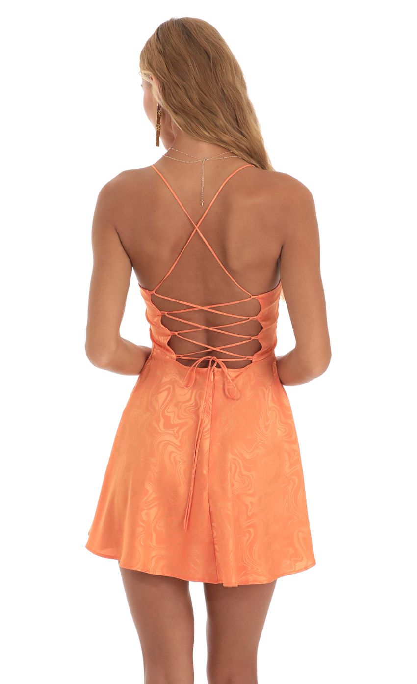 Picture Rowena Swirl A-Line Mini Dress in Orange. Source: https://media.lucyinthesky.com/data/May23/850xAUTO/52c6c677-3fe0-43c8-a0c9-11fe0d97d913.jpg