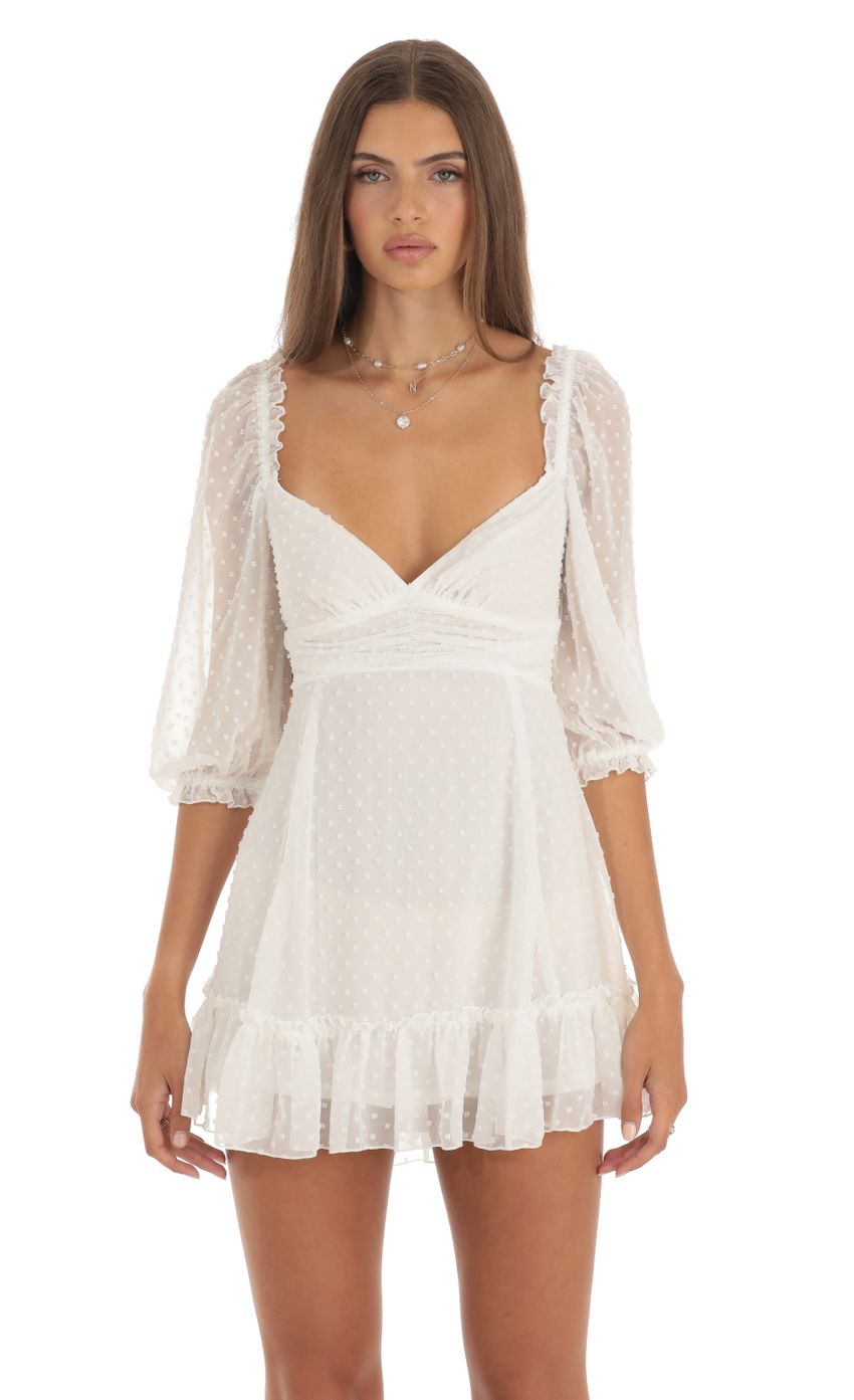 Picture Soula Chiffon Dotted A-Line Mini Dress in White. Source: https://media.lucyinthesky.com/data/May23/850xAUTO/5914c45f-6ed7-48be-8798-7f62634681c5.jpg