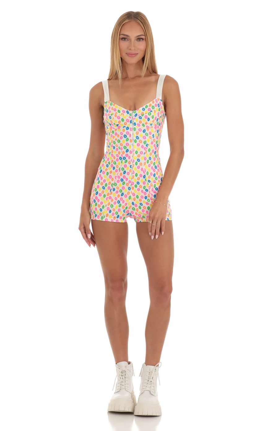 Picture Rada Hook and Eye Romper in Multi Kiss Print. Source: https://media.lucyinthesky.com/data/May23/850xAUTO/5e67fc16-894d-435e-ae54-eb33bead07fb.jpg