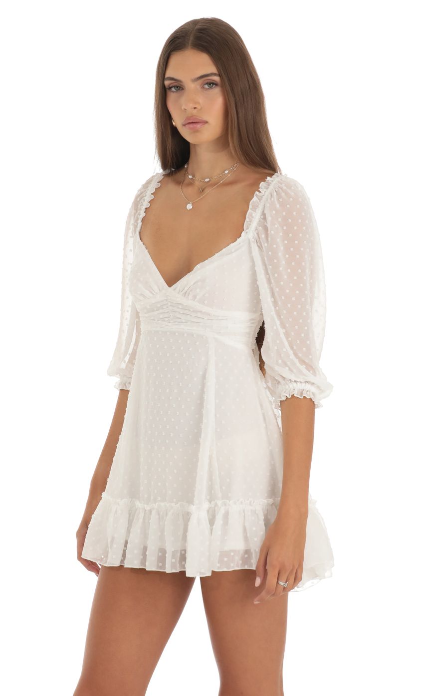 Picture Soula Chiffon Dotted A-Line Mini Dress in White. Source: https://media.lucyinthesky.com/data/May23/850xAUTO/60d349b6-9b06-40cd-8229-f036a2f17549.jpg