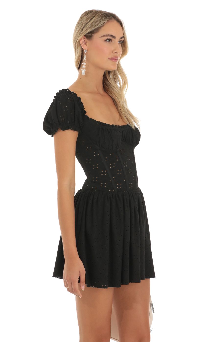 Picture Ronnie Corset Puff Sleeve Dress in Black. Source: https://media.lucyinthesky.com/data/May23/850xAUTO/62c1c4ed-bfc9-4f19-a434-6d6281a52e3b.jpg