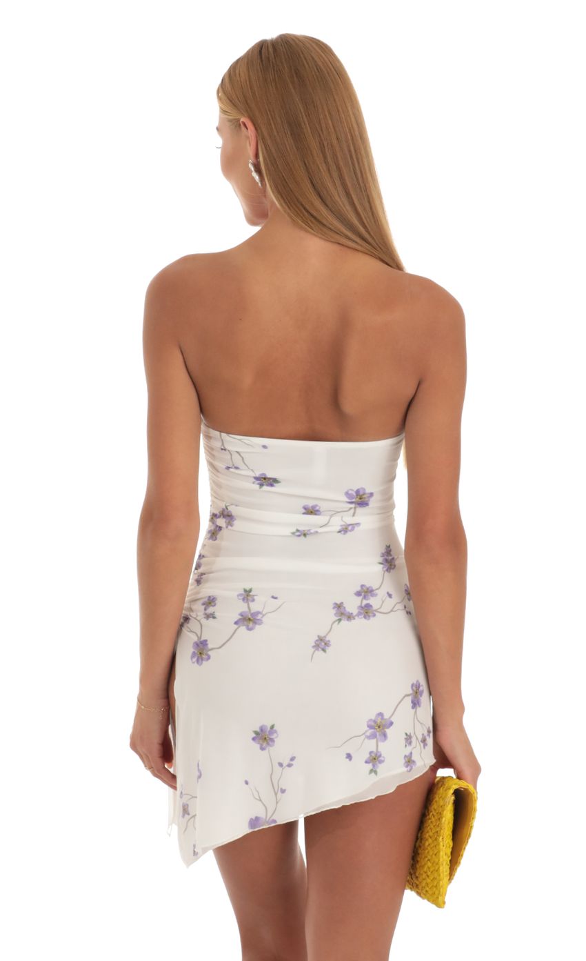 Picture Katrina Strapless Dress in White and Purple Floral Print. Source: https://media.lucyinthesky.com/data/May23/850xAUTO/742c9939-cc5d-42d7-b7a0-4da094fa29fd.jpg