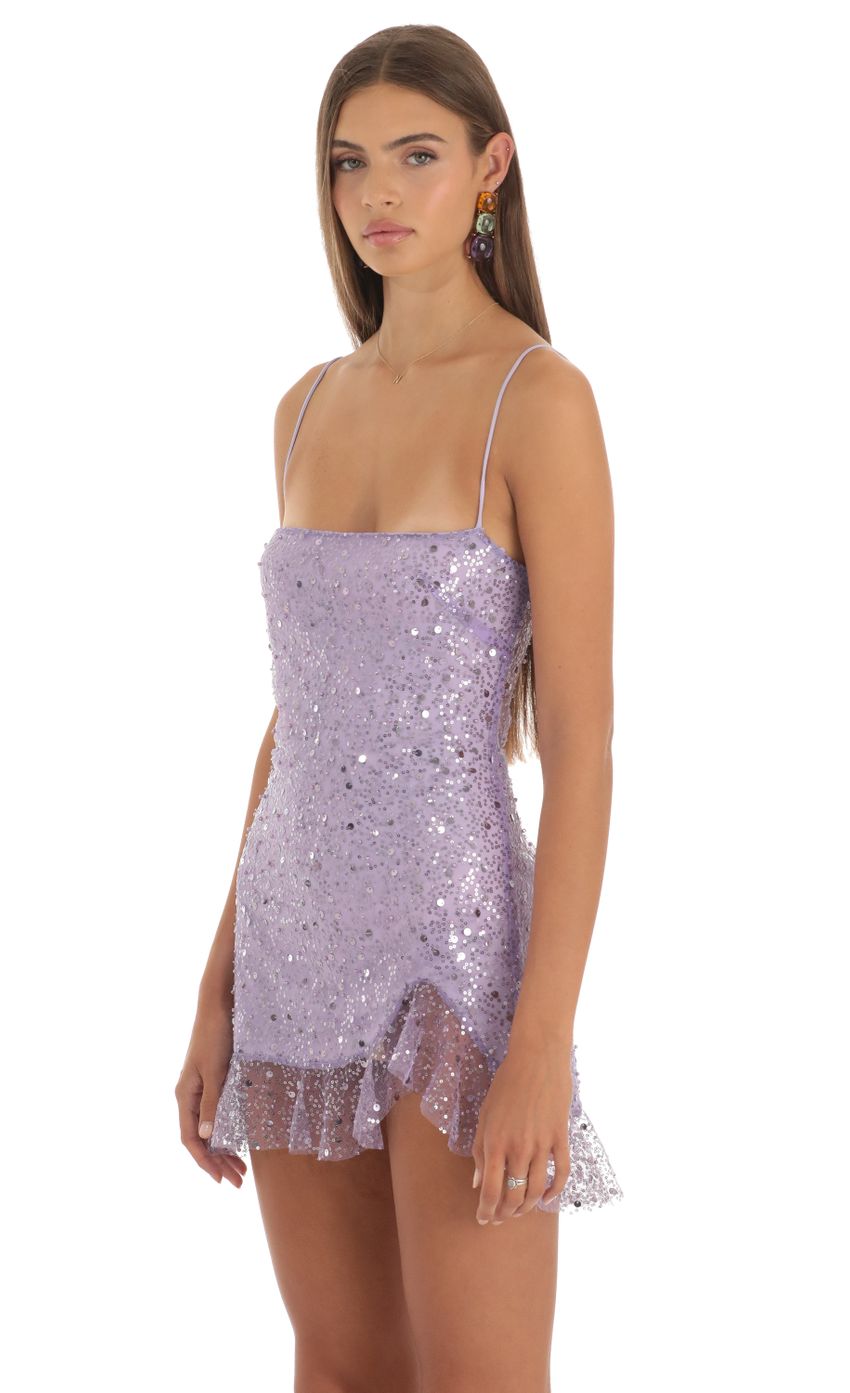 Picture Shan Shimmer Sequin Ruffle Dress in Purple. Source: https://media.lucyinthesky.com/data/May23/850xAUTO/7ab51078-0b53-4ec7-b136-a11ea559beb5.jpg
