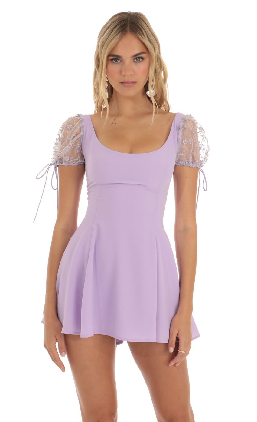 Picture Wannda Embroidered Puff Sleeve Dress in Lilac. Source: https://media.lucyinthesky.com/data/May23/850xAUTO/84664d39-2385-4cbc-b153-860bf19eef4f.jpg