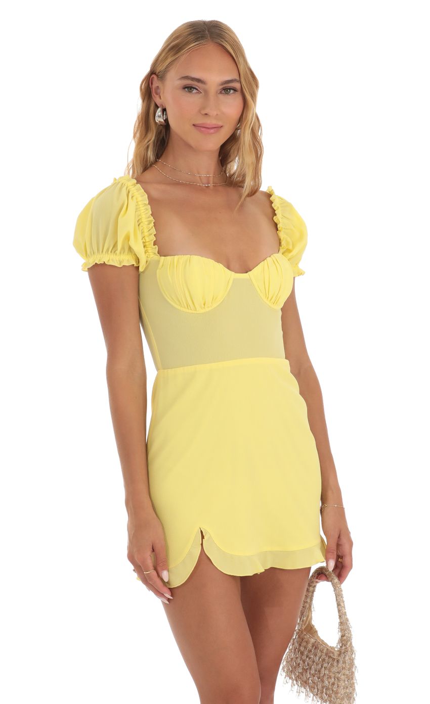 Picture Harris Puff Sleeve Mini Dress in Yellow. Source: https://media.lucyinthesky.com/data/May23/850xAUTO/9238a205-ca53-48b8-ac6b-557db29050cf.jpg