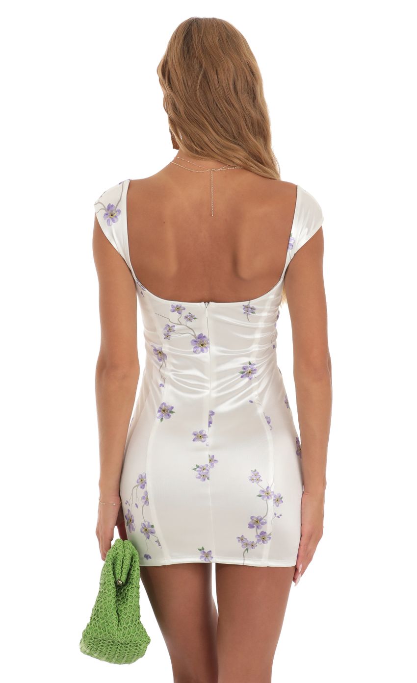 Picture Tansy Satin Floral Fitted Mini Dress in White. Source: https://media.lucyinthesky.com/data/May23/850xAUTO/9652aaae-9c5a-42c1-a306-cdfd5229e1d8.jpg