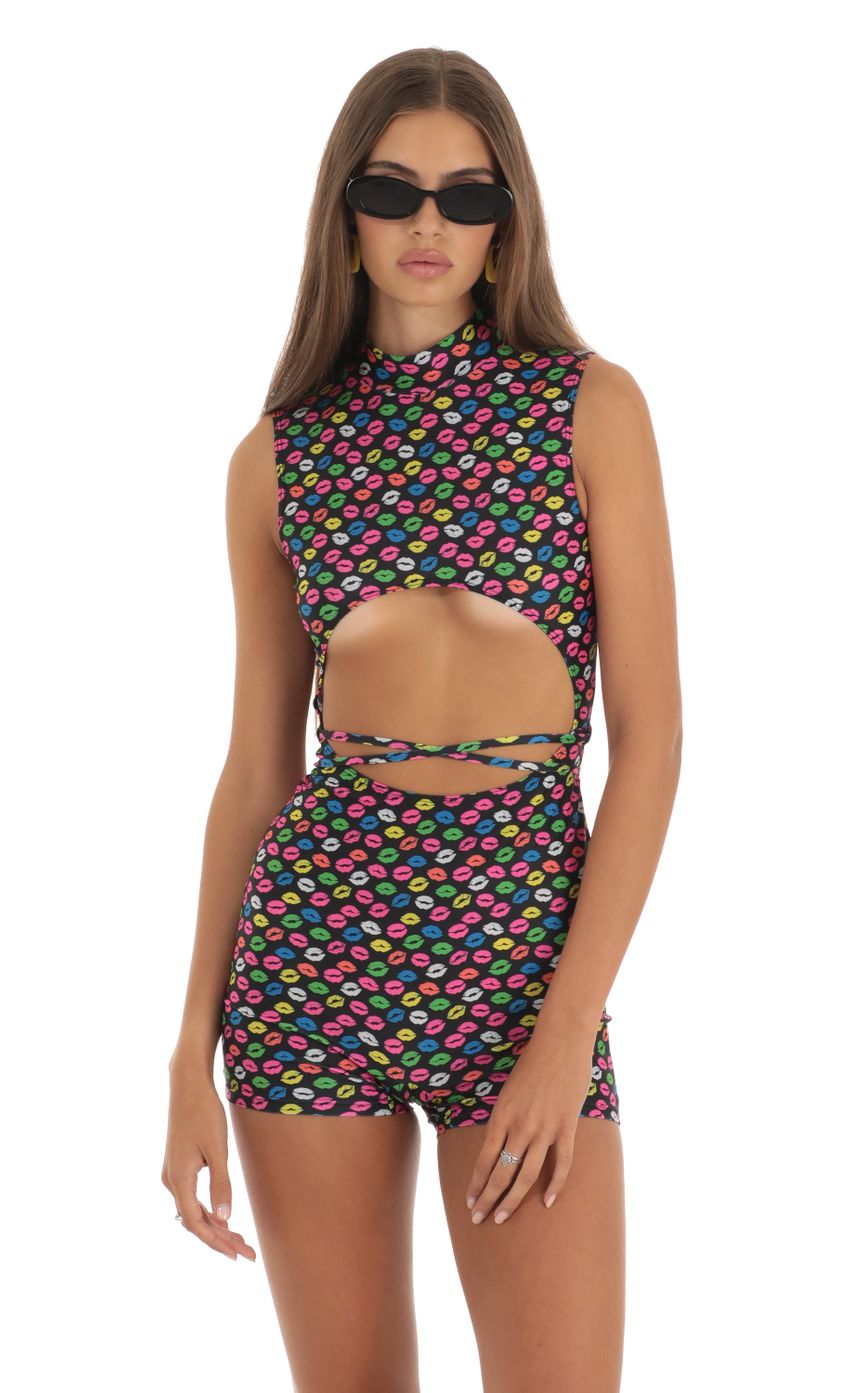 Picture Keily Kiss Cutout Romper in Black. Source: https://media.lucyinthesky.com/data/May23/850xAUTO/9710170f-234b-4b19-b102-77865c93ce71.jpg