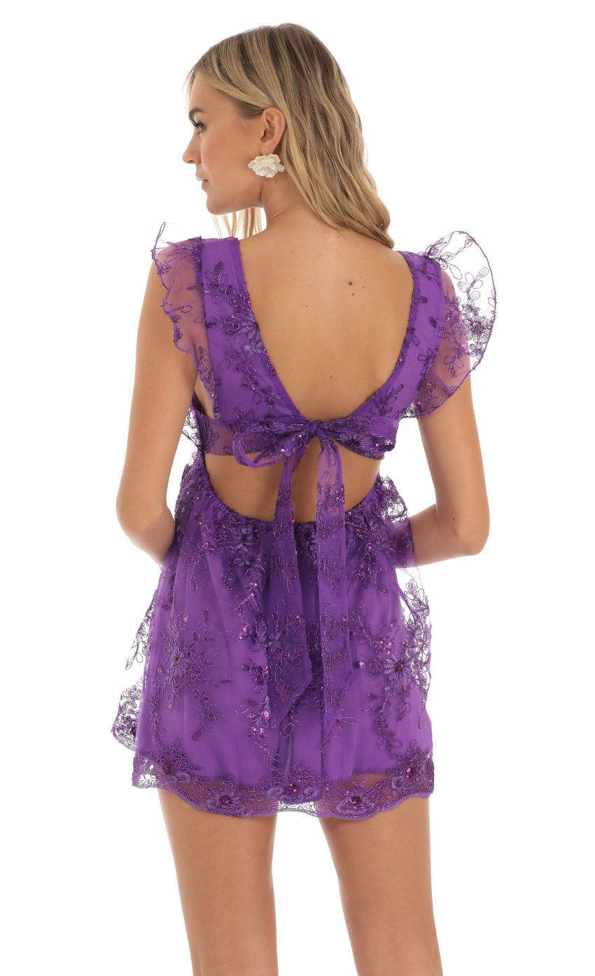 Picture Flor Sequin Embroidered Baby Doll Dress in Purple. Source: https://media.lucyinthesky.com/data/May23/850xAUTO/97d7dd5d-6f46-47ed-bc48-c7a444b4c8d3.jpg