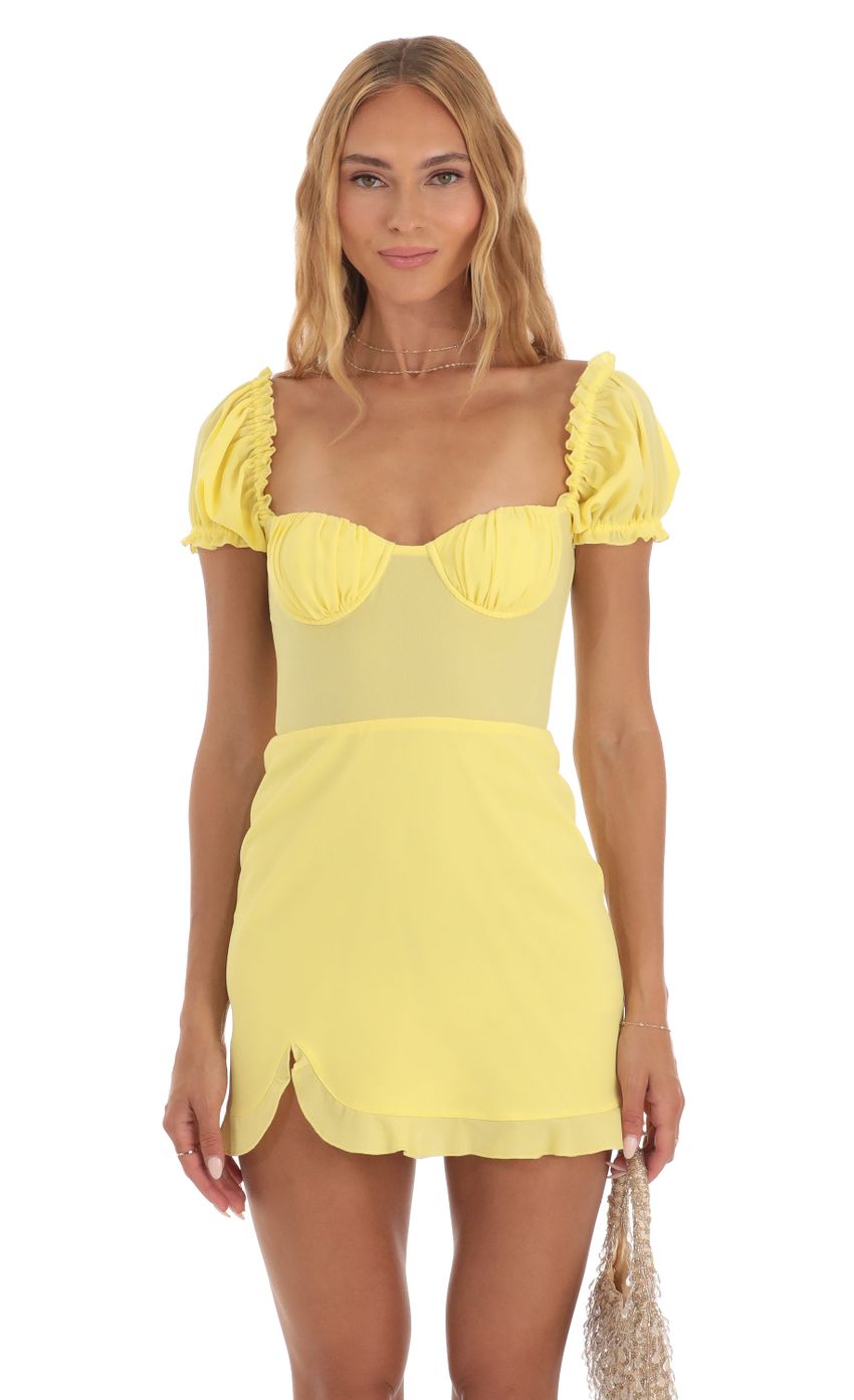 Picture Harris Puff Sleeve Mini Dress in Yellow. Source: https://media.lucyinthesky.com/data/May23/850xAUTO/98bedd21-f2d3-4c61-937c-5b1264639fb7.jpg