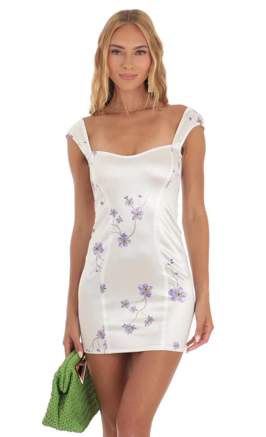 Picture Tansy Satin Floral Fitted Mini Dress in White. Source: https://media.lucyinthesky.com/data/May23/850xAUTO/aa3a7789-eb84-4a51-b135-f71d41eef8bb.jpg