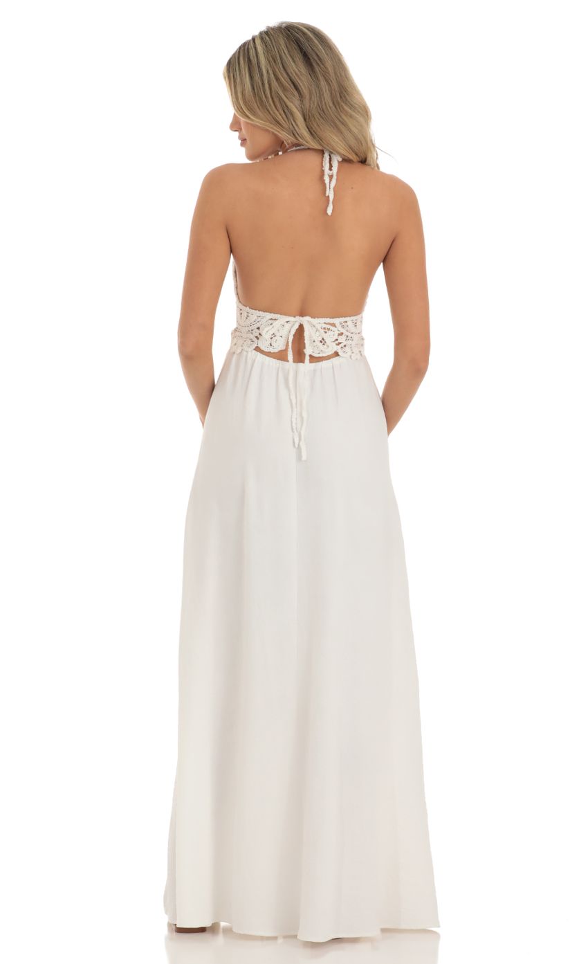 Picture Quinne Crochet Cut-Out Maxi Dress in White. Source: https://media.lucyinthesky.com/data/May23/850xAUTO/b16e2dcd-c97c-4ef1-abd1-823cf8dc1aad.jpg