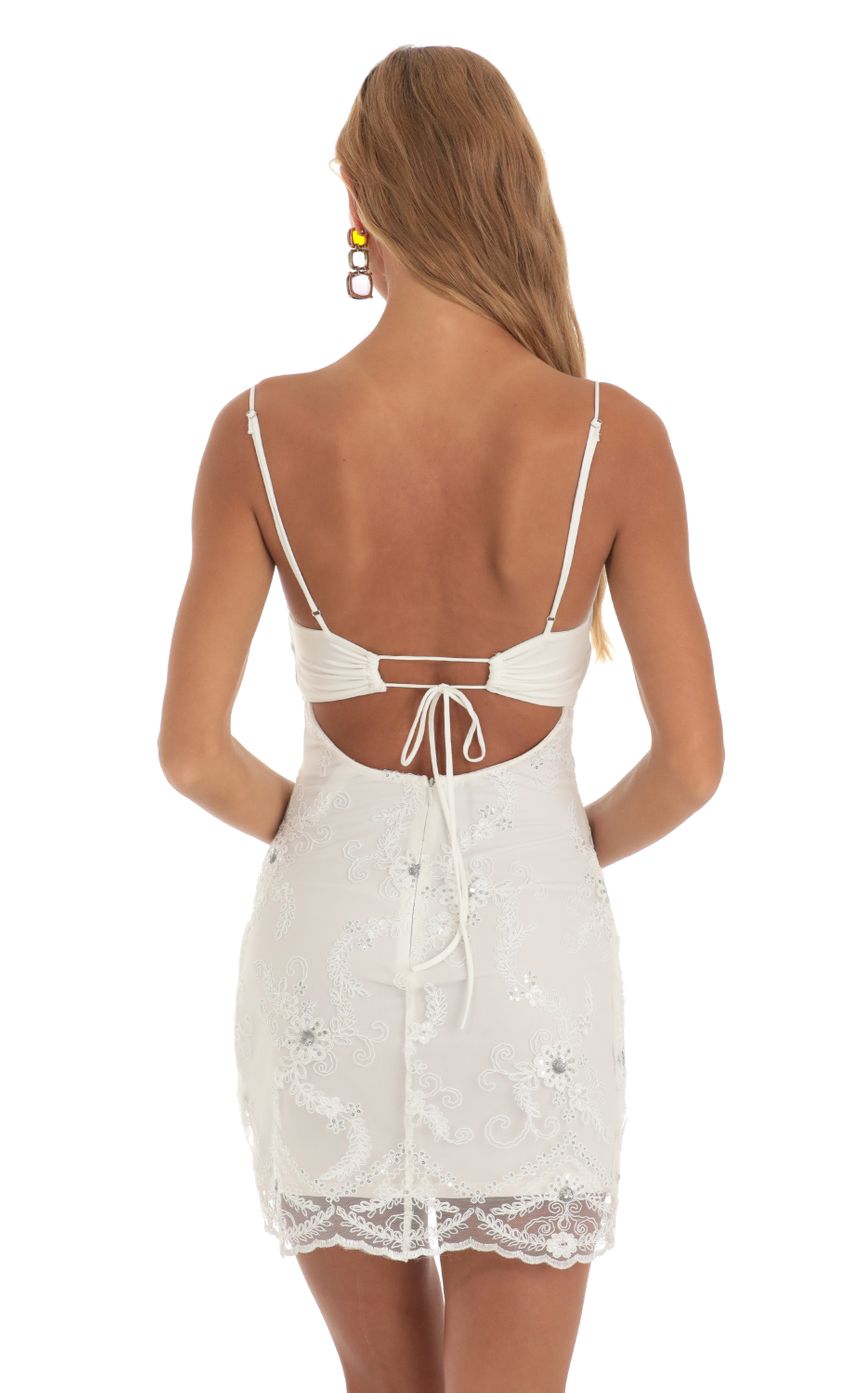 Picture Elba Embroidered Sequin Cutout Mini Dress in White. Source: https://media.lucyinthesky.com/data/May23/850xAUTO/c459a137-a336-4961-b00d-b94d53d135a9.jpg