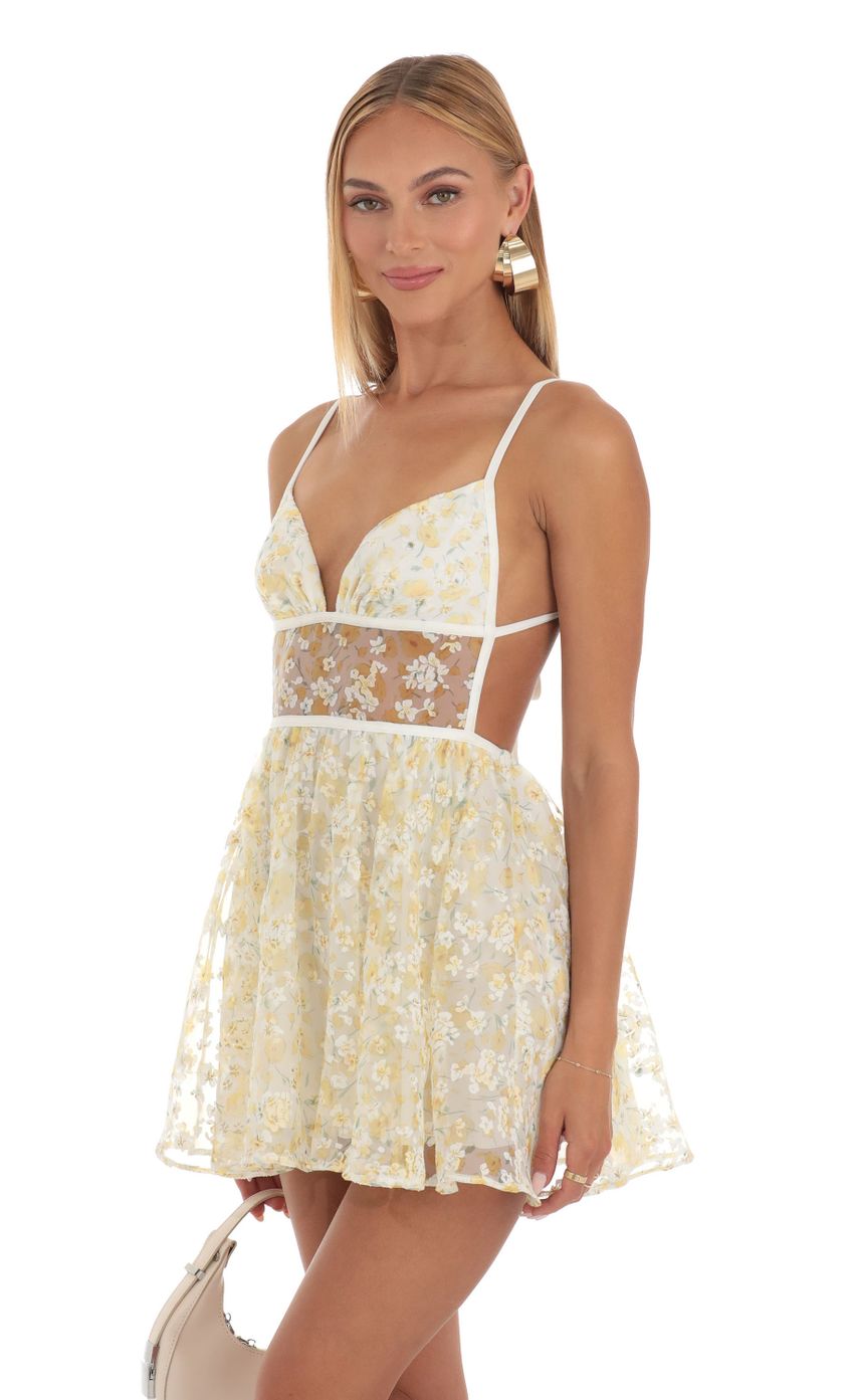 Picture Jaelynn Shimmer Floral Mini Dress in Yellow. Source: https://media.lucyinthesky.com/data/May23/850xAUTO/c8748090-e6a4-4a75-a468-8b9605793be4.jpg