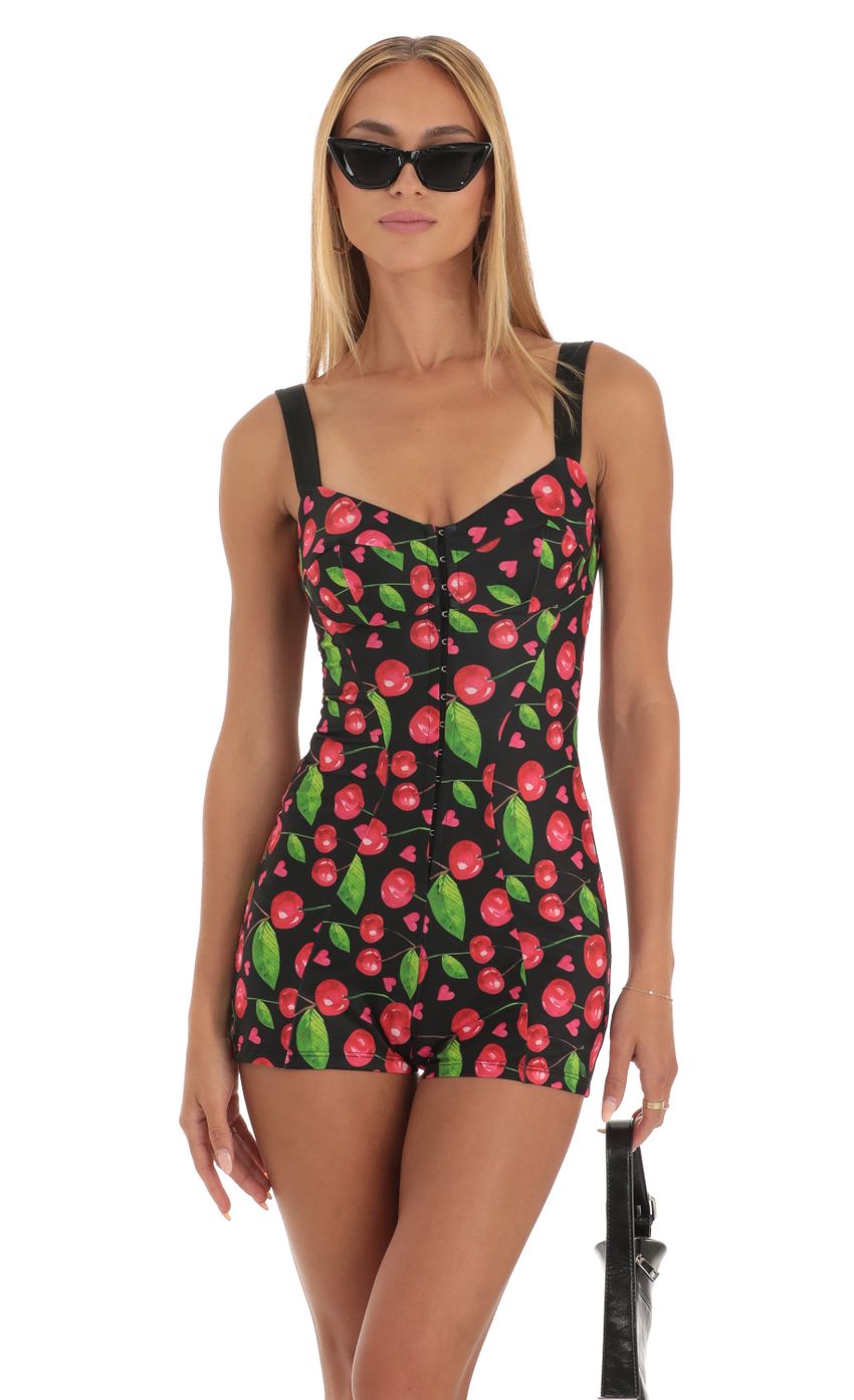 Picture Rada Hook and Eye Romper in Black Cherry Print. Source: https://media.lucyinthesky.com/data/May23/850xAUTO/c968eed6-327b-49d5-9bcf-90ca8a8fc7f0.jpg