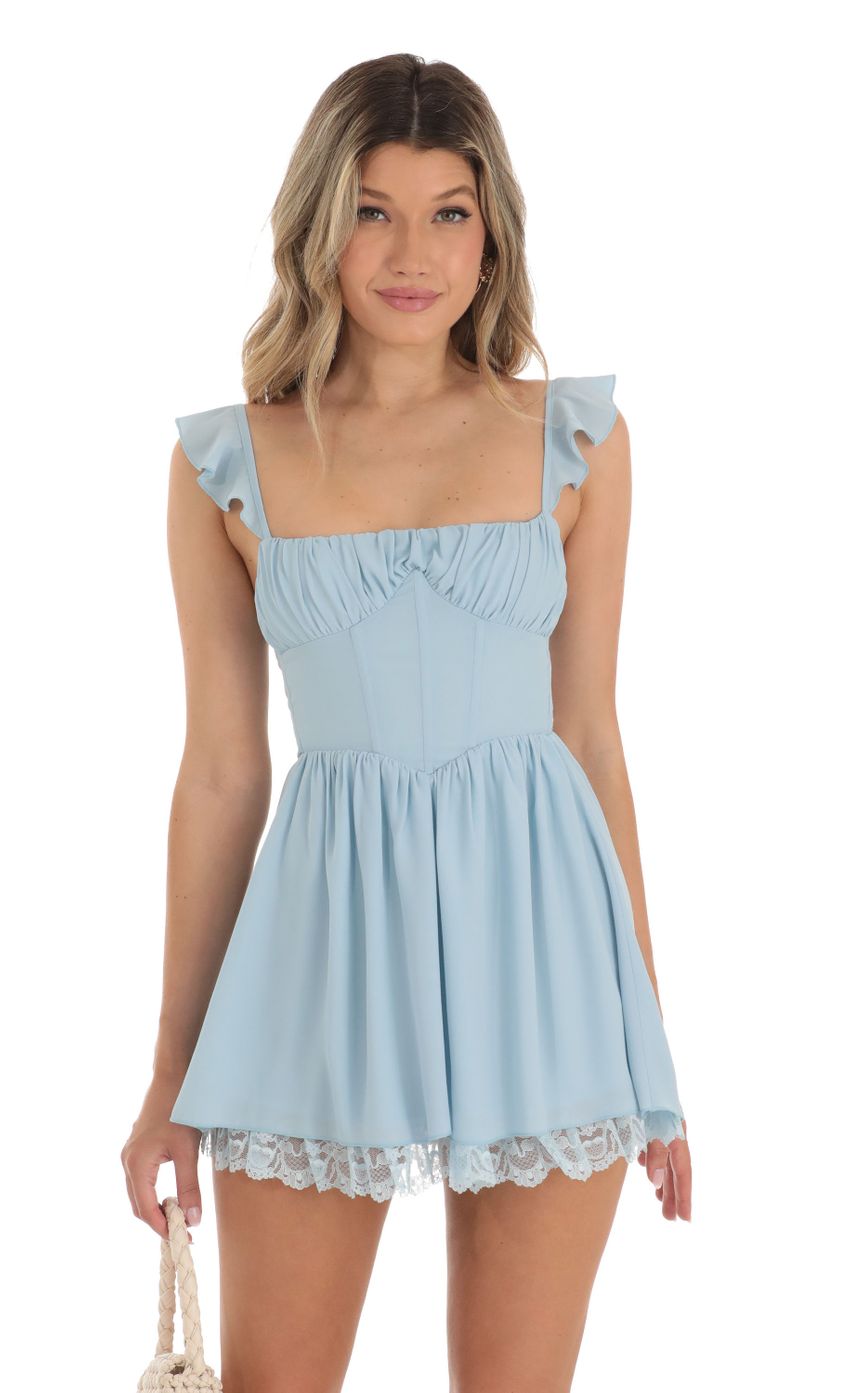 Picture Calix Ruffle Corset Dress in Sky Blue. Source: https://media.lucyinthesky.com/data/May23/850xAUTO/d4ceeedc-d5dc-4264-a9bb-46c535e64c46.jpg