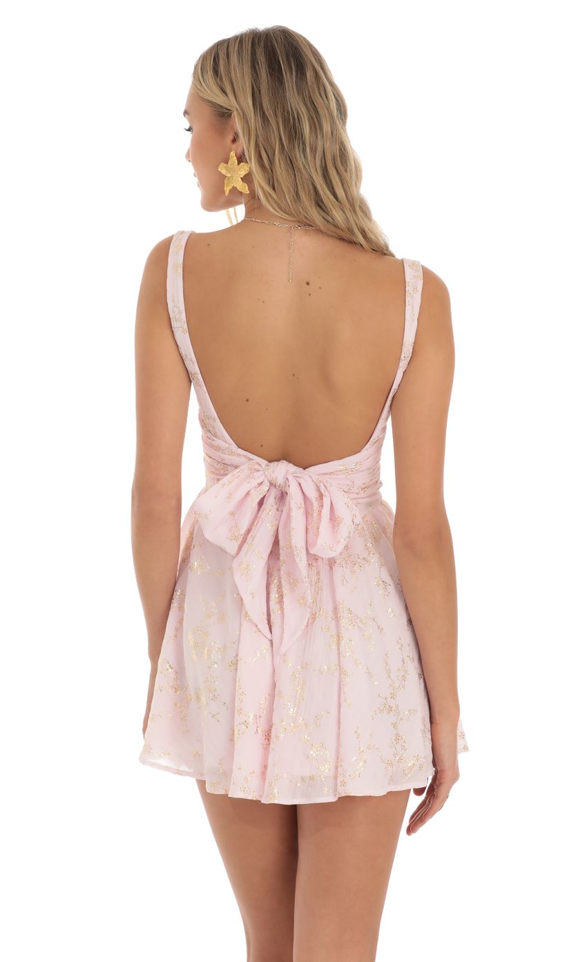 Picture Indiana Floral Shimmer Mini Dress in Pink. Source: https://media.lucyinthesky.com/data/May23/850xAUTO/eab6e910-667a-4058-827f-04635030b68d.jpg