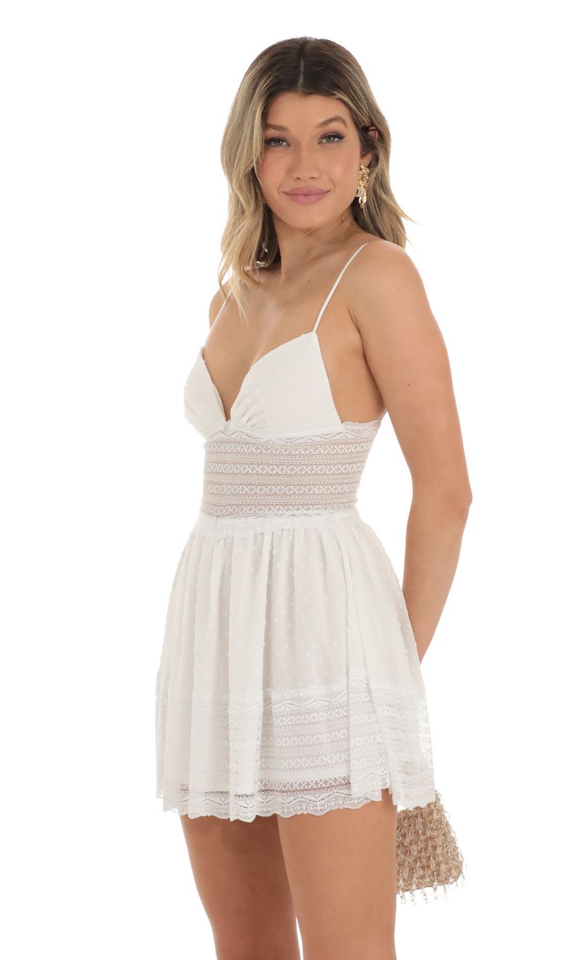 Picture Diona Dotted Chiffon Dress With Lace Inserts in White. Source: https://media.lucyinthesky.com/data/May23/850xAUTO/f27aedbf-0393-4496-8bf0-cae5fa824d40.jpg