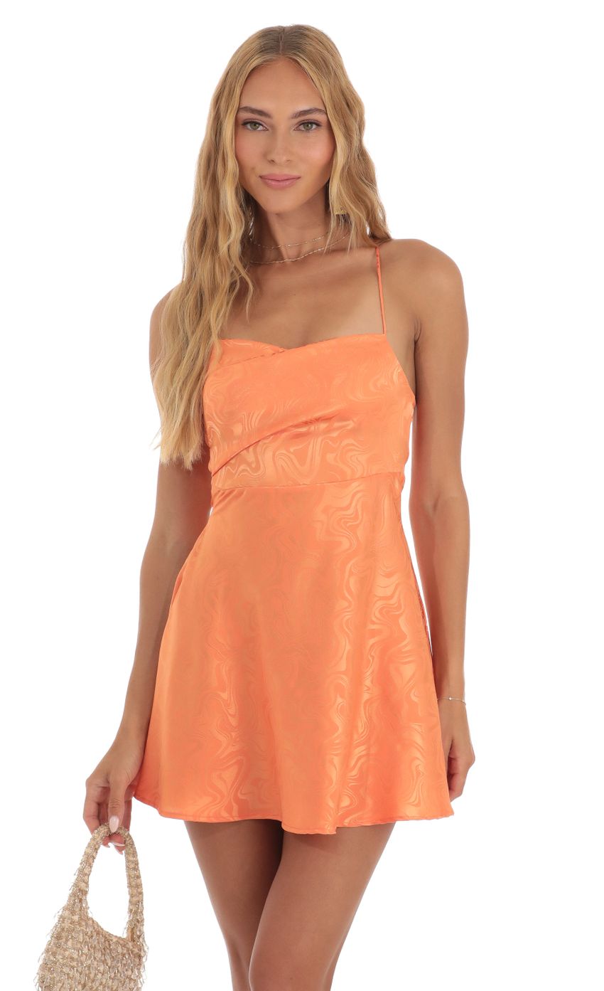 Picture Rowena Swirl A-Line Mini Dress in Orange. Source: https://media.lucyinthesky.com/data/May23/850xAUTO/f5c4f3be-8cde-4597-84c2-afe7b0c67e5b.jpg