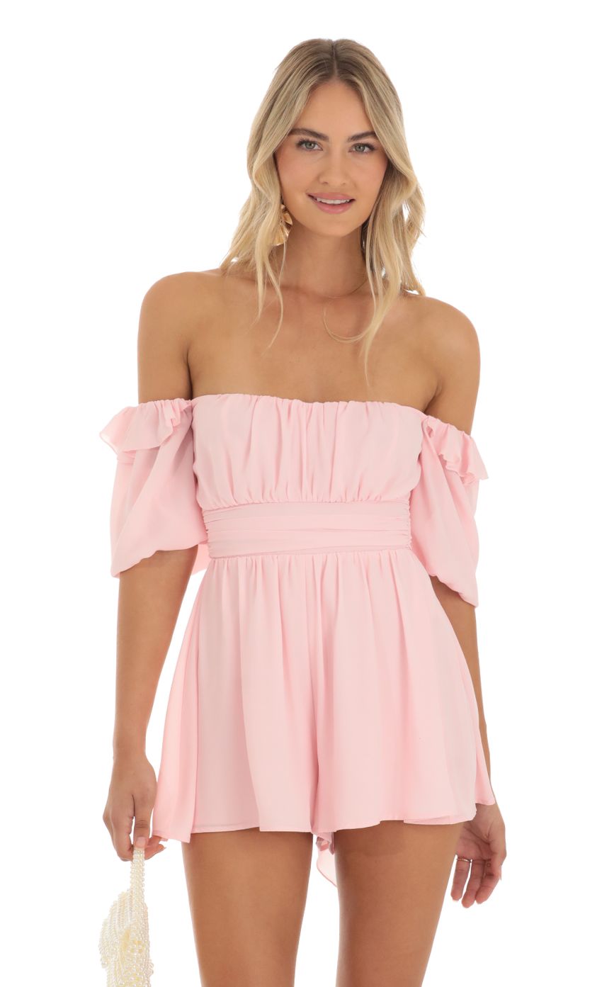 Picture Tracie Chiffon Off The Shoulder Romper in Baby Pink. Source: https://media.lucyinthesky.com/data/May23/850xAUTO/fe000dcc-c856-4c6d-8754-36c270692a15.jpg