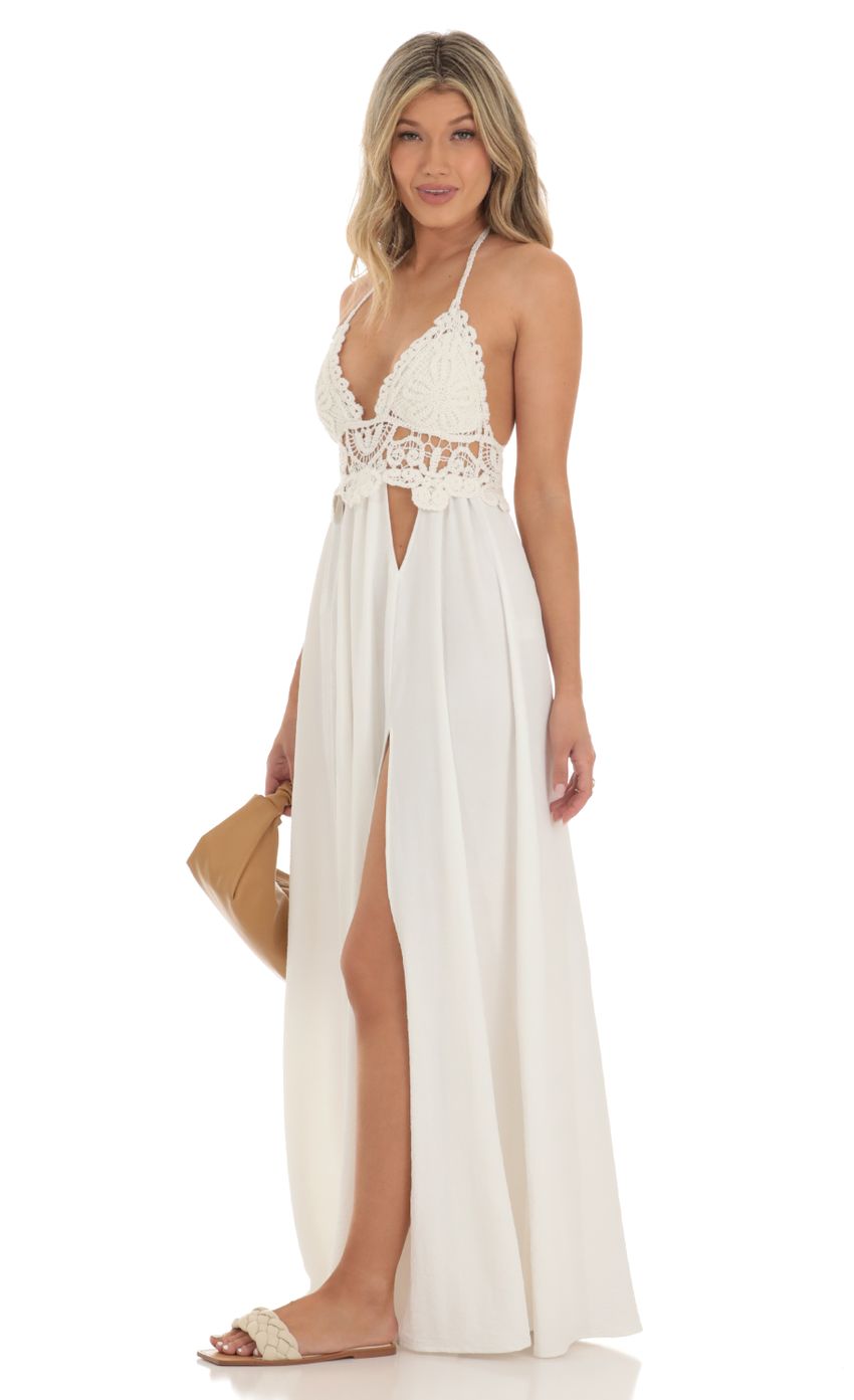 Picture Quinne Crochet Cut-Out Maxi Dress in White. Source: https://media.lucyinthesky.com/data/May23/850xAUTO/fff998a4-318e-4d6a-9d9e-c67f4023149c.jpg