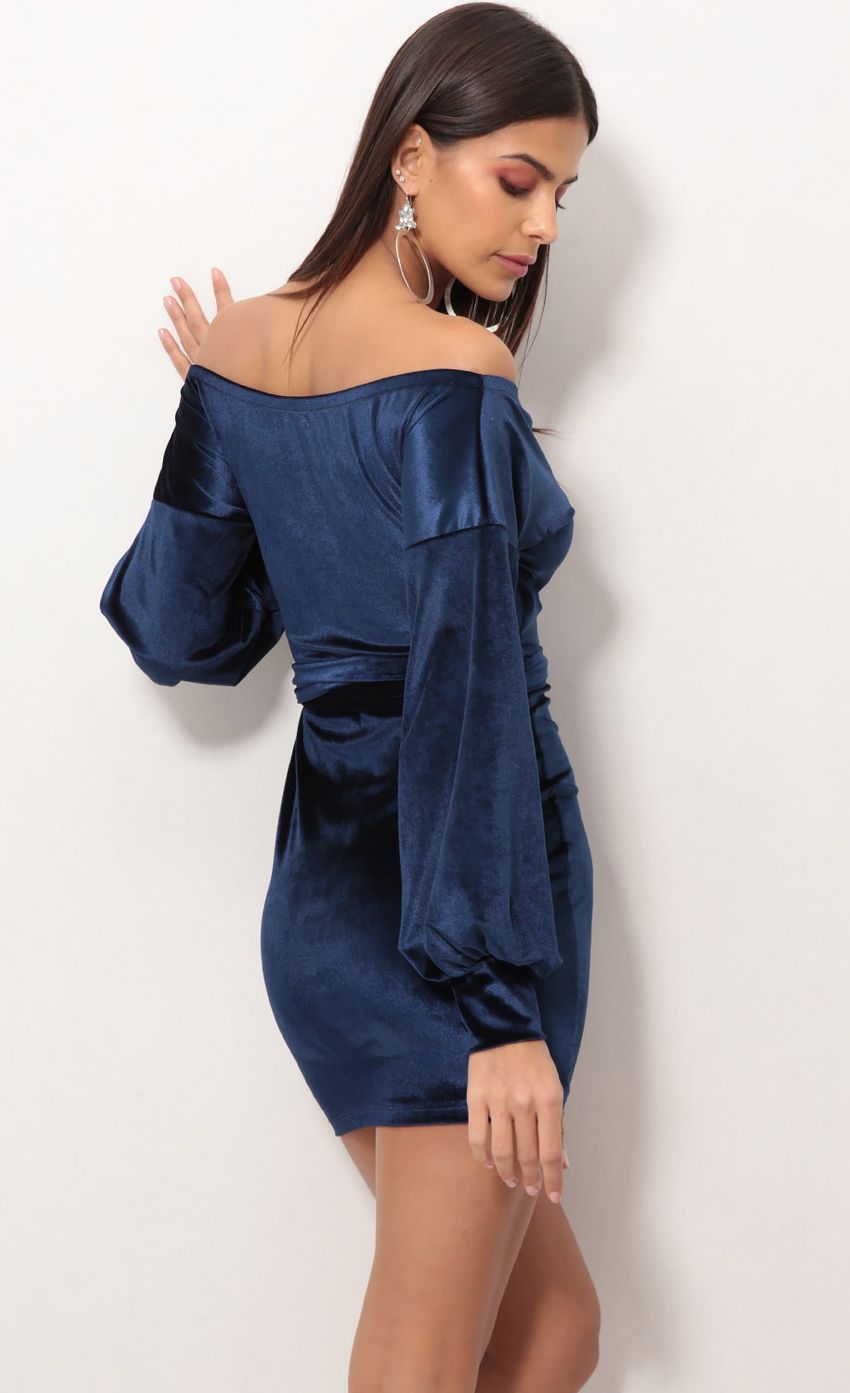 Picture Adela Off The Shoulder Velvet Dress in Navy. Source: https://media.lucyinthesky.com/data/Nov18_1/850xAUTO/0Y5A8610.JPG
