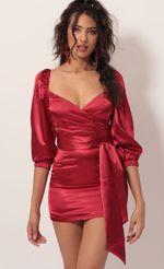 Picture Miley Puff Sleeve Wrap Dress in Red Satin. Source: https://media.lucyinthesky.com/data/Nov19_2/150xAUTO/781A4534.JPG