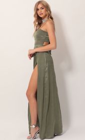Picture thumb Gala Satin Maxi Dress in Olive Green. Source: https://media.lucyinthesky.com/data/Nov19_2/170xAUTO/781A4156.JPG