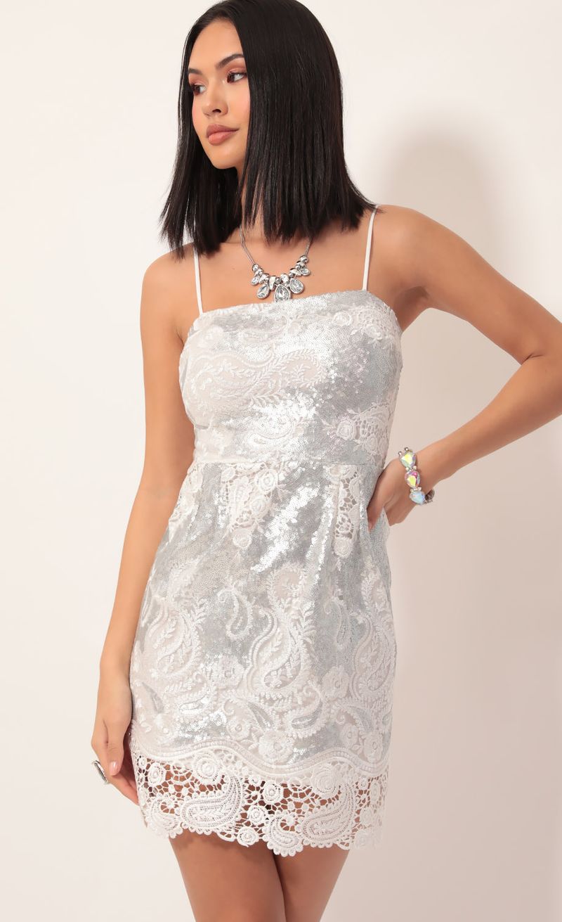 Picture Moira Sequin Lace Dress in White Silver. Source: https://media.lucyinthesky.com/data/Nov19_2/800xAUTO/781A6872.JPG