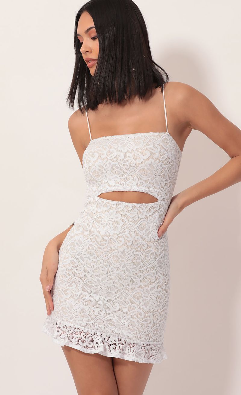 Picture Rae Lace Cutout Ruffle Dress in White. Source: https://media.lucyinthesky.com/data/Nov19_2/800xAUTO/781A8604.JPG