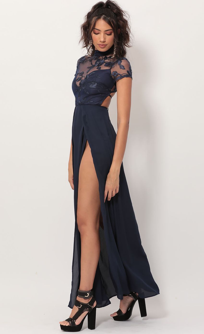 Picture Heiress Lace Maxi Dress in Navy. Source: https://media.lucyinthesky.com/data/Nov19_2/850xAUTO/781A3050.JPG