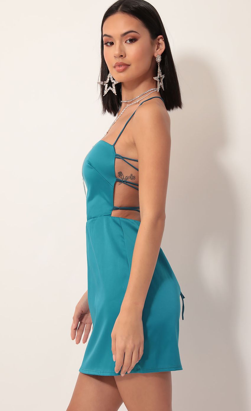 Picture Lulu Satin Lace-up Dress in Teal. Source: https://media.lucyinthesky.com/data/Nov19_2/850xAUTO/781A5634.JPG
