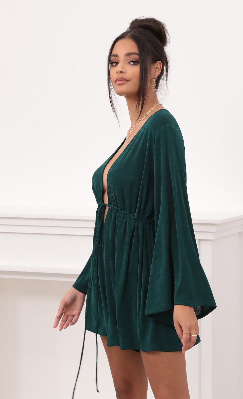 Picture Kadee Bell Sleeve Romper in Emerald Green. Source: https://media.lucyinthesky.com/data/Nov20_2/850xAUTO/1V9A13501.JPG
