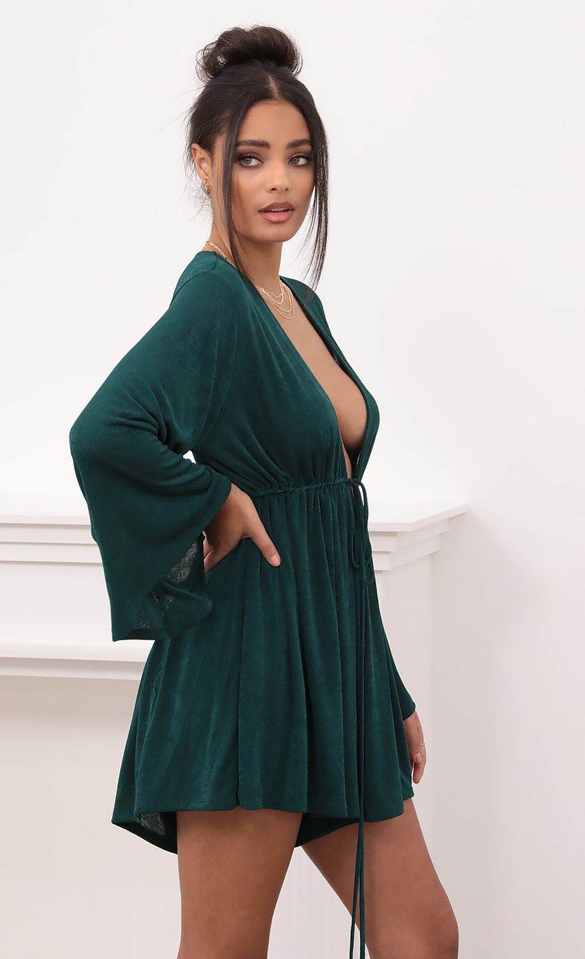 Picture Kadee Bell Sleeve Romper in Emerald Green. Source: https://media.lucyinthesky.com/data/Nov20_2/850xAUTO/1V9A1378.JPG