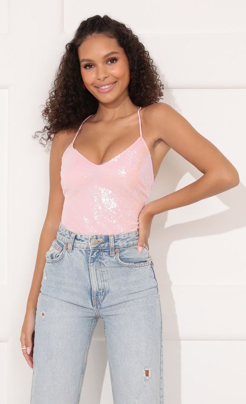 Picture Party Sequin Bodysuit in Baby Pink. Source: https://media.lucyinthesky.com/data/Nov21_1/500xAUTO/1V9A1005.JPG
