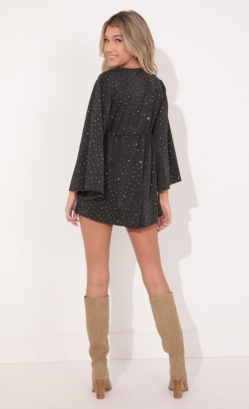 Picture Kadee Bell Sleeve Romper in Twinkling Black. Source: https://media.lucyinthesky.com/data/Nov21_1/500xAUTO/1V9A1045.JPG