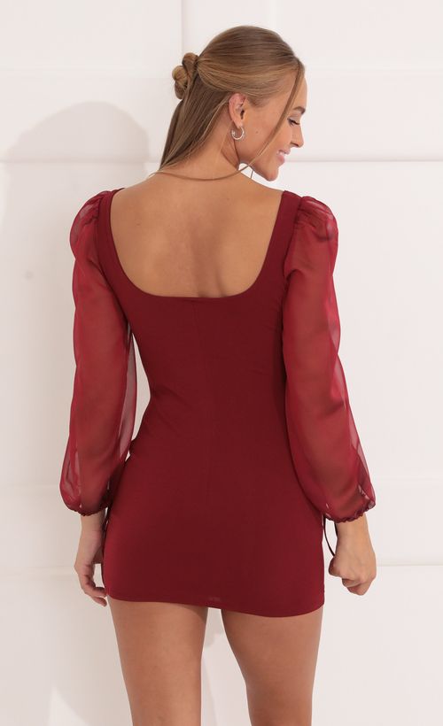 Picture Mary Lou Long Sleeve Cutout Dress in Burgundy. Source: https://media.lucyinthesky.com/data/Nov21_1/500xAUTO/1V9A6625.JPG