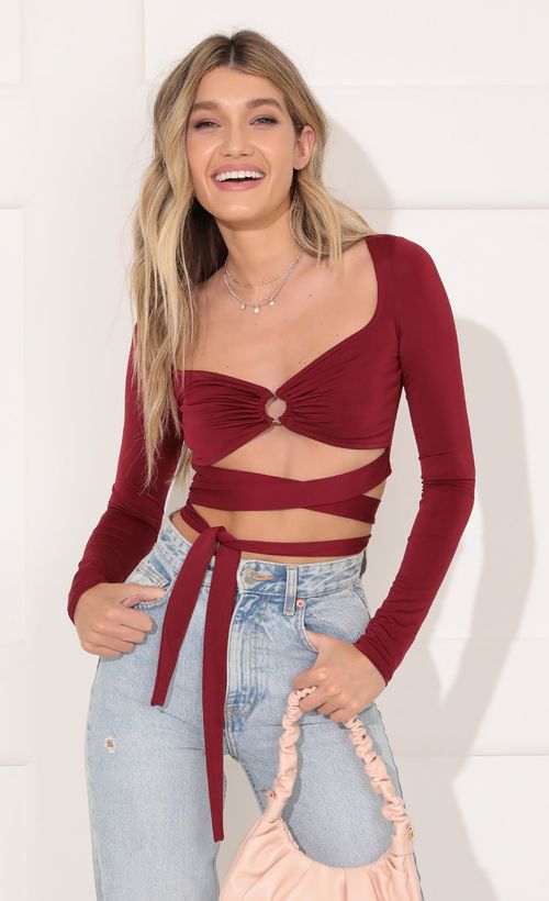 Picture Tori Long Sleeve Sparkle Top in Burgundy. Source: https://media.lucyinthesky.com/data/Nov21_1/500xAUTO/1V9A7154.JPG