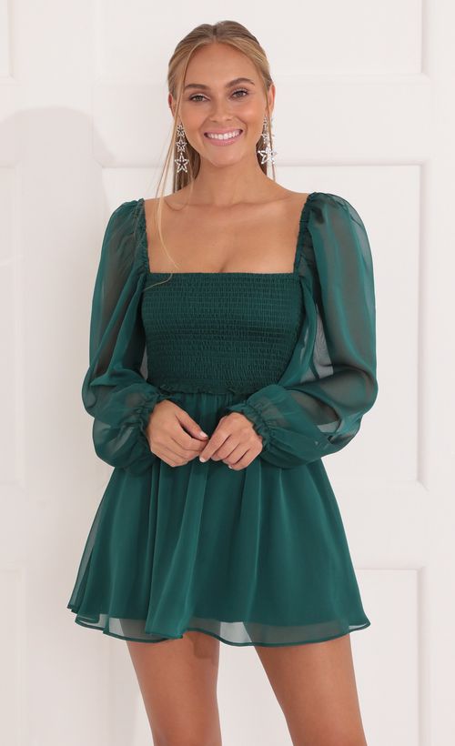 Picture Kaz Fit and Flare Dress in Green. Source: https://media.lucyinthesky.com/data/Nov21_1/500xAUTO/1V9A8937.JPG