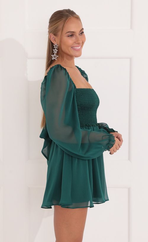 Picture Kaz Fit and Flare Dress in Green. Source: https://media.lucyinthesky.com/data/Nov21_1/500xAUTO/1V9A8988.JPG