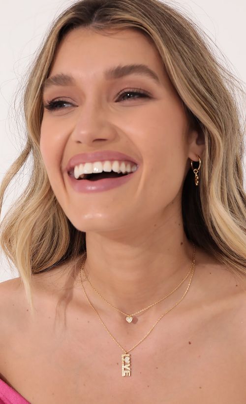 Picture Love Me Layered Necklace in Gold. Source: https://media.lucyinthesky.com/data/Nov21_1/500xAUTO/2V9A1521.JPG